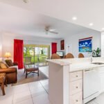 Ground floor, turn-key 1 bedroom with beach views next door to Rum Point Restaurant and Beach and 2 mins drive to Kaibo! Open plan renovated living room, kitchen, dining, leading to the private screened-in patio. One huge bedroom with a king bed. Stunning beach views in a 3 Acre Site with 675 feet of beach frontage. On site Pool, tennis court, gym, game room, two beaches, and Rum Point Club next door. The area directly in front and to the left of the Retreat is a designated and protected marine park. The snorkelling is excellent right in front of the complex. Sunsets are often enjoyed from the private beach all year round. This quieter side of the island provides peace and tranquillity. Head next door to Red Sail for motorized and non-motorized water sport options or excursions to Stingray city or scuba diving when you are ready for some action.